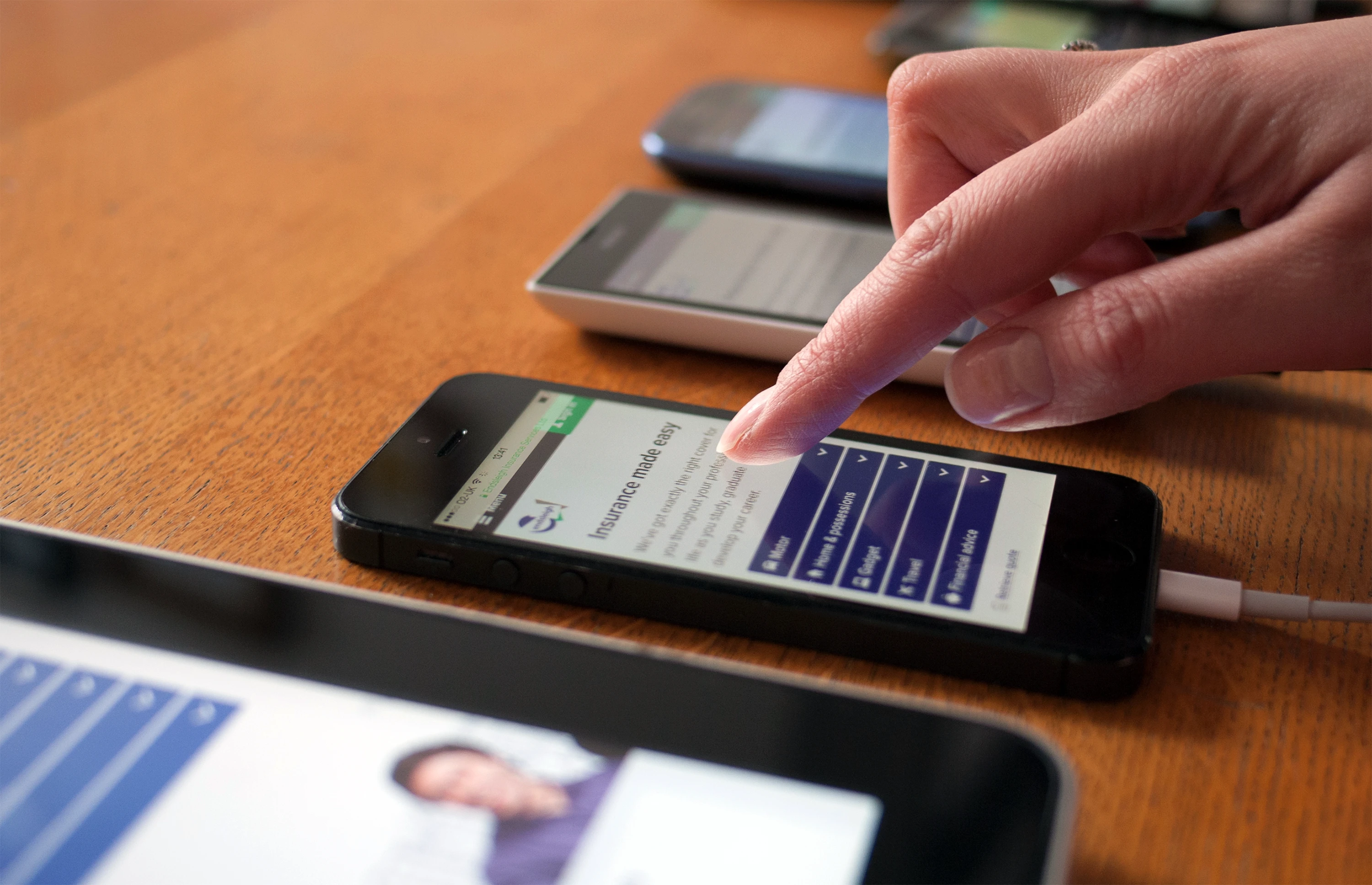 Photo of several mobile devices next to each other for testing purposes