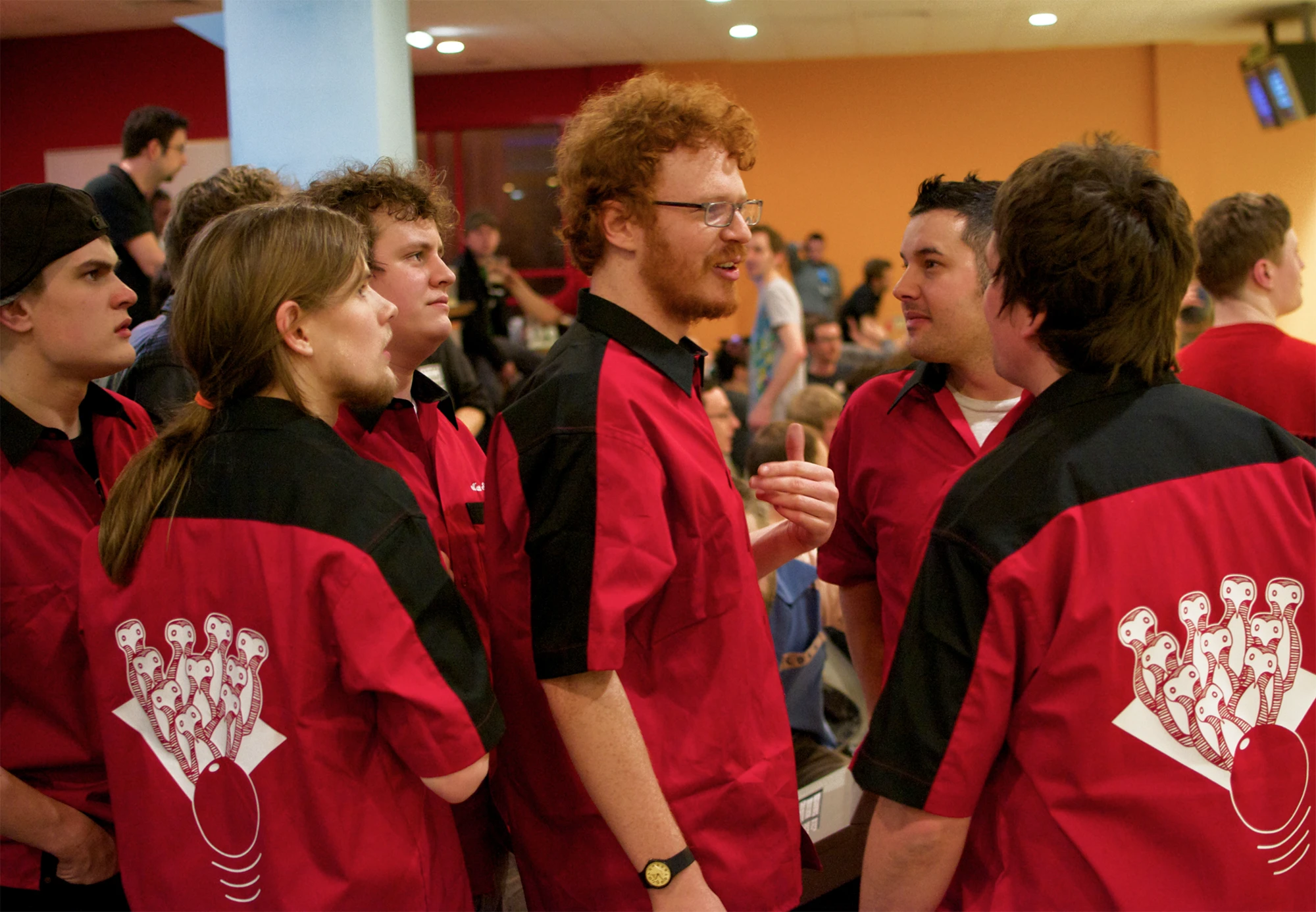 Erskine team members with their bowling shirts on at the social